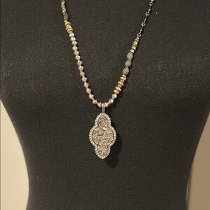 Elegant Silver and Gold Pendant Necklace